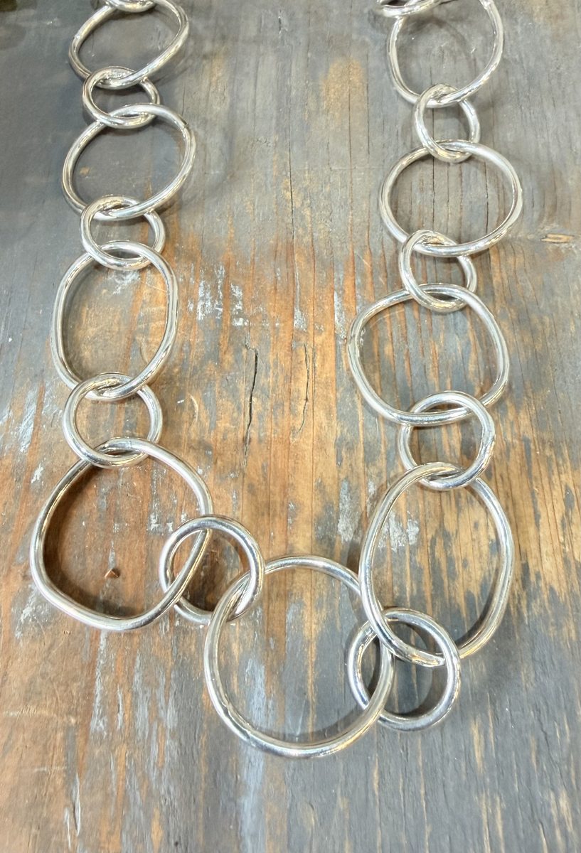 The Loops chain, hammered silver links, made by hand.